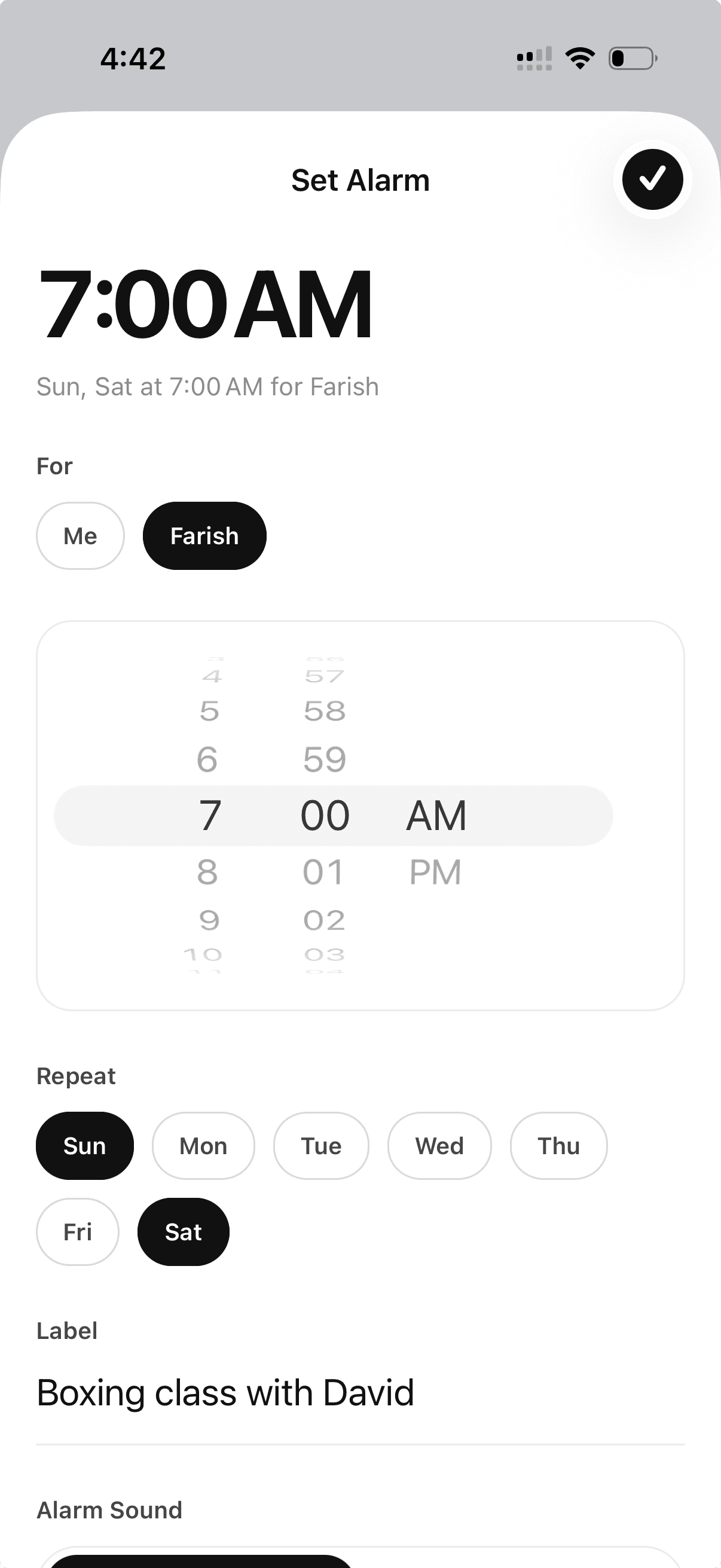 Alarmee set alarm screen with time picker and friend selector